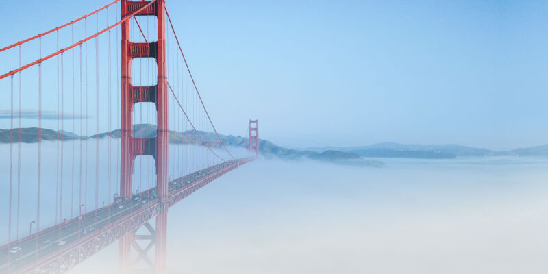 bridge fading into the clouds