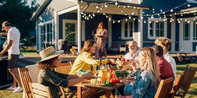 Family having summer bbq in backyard