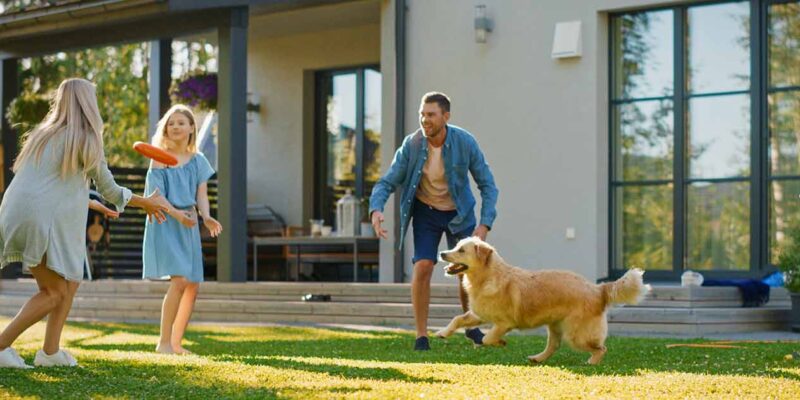 Family playing in yard