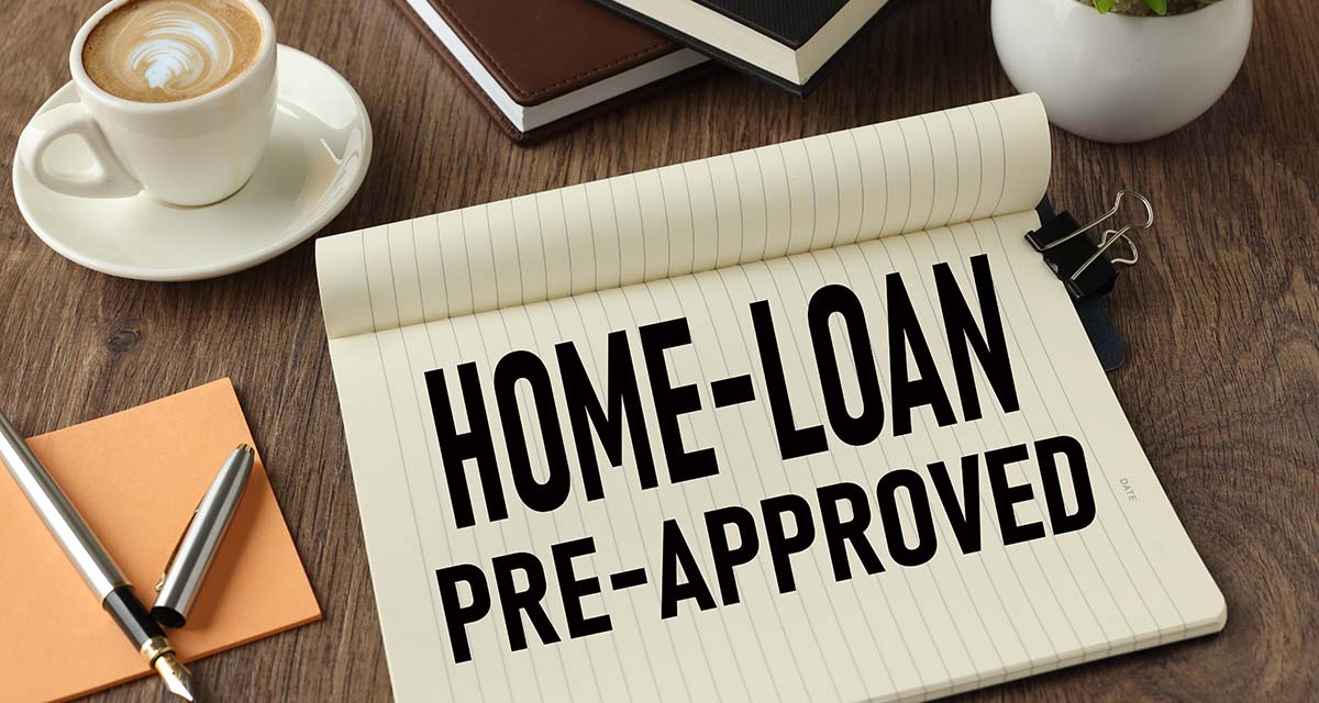 Pad of Paper says Home-loan pre-approved