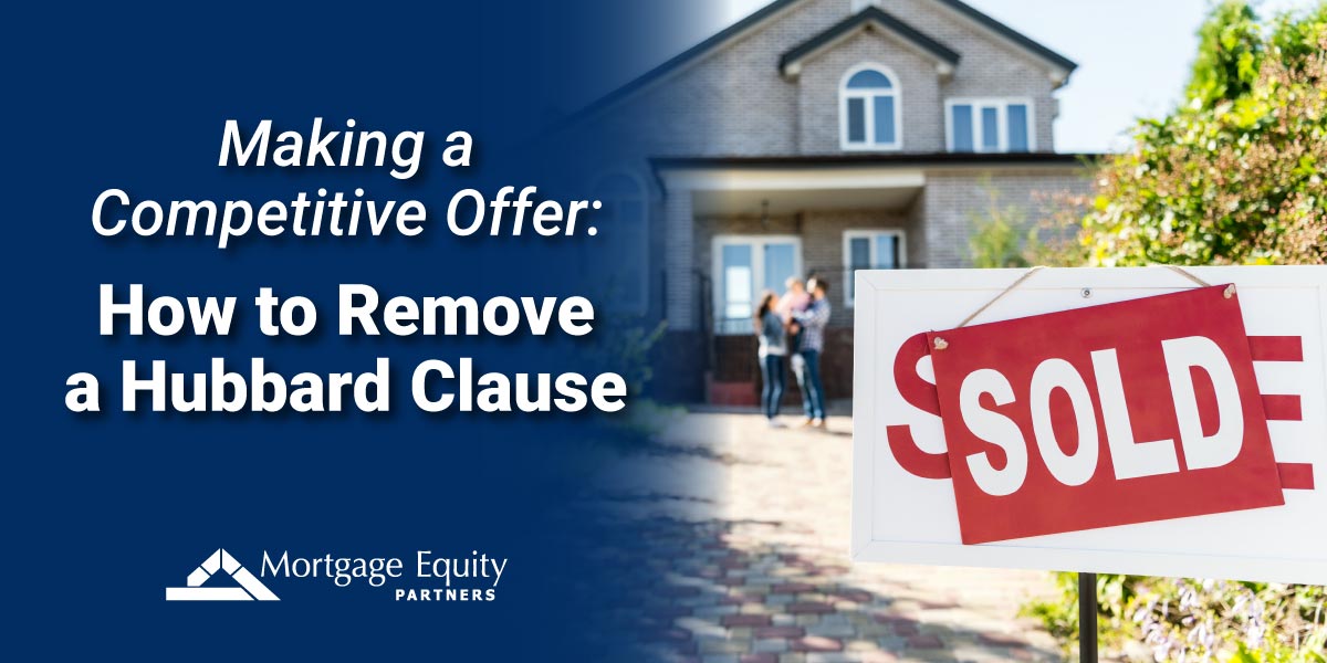 couple outside house with sold sign