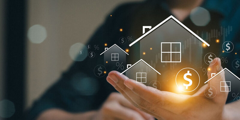 man holding out hand with bridge loan graphic and house