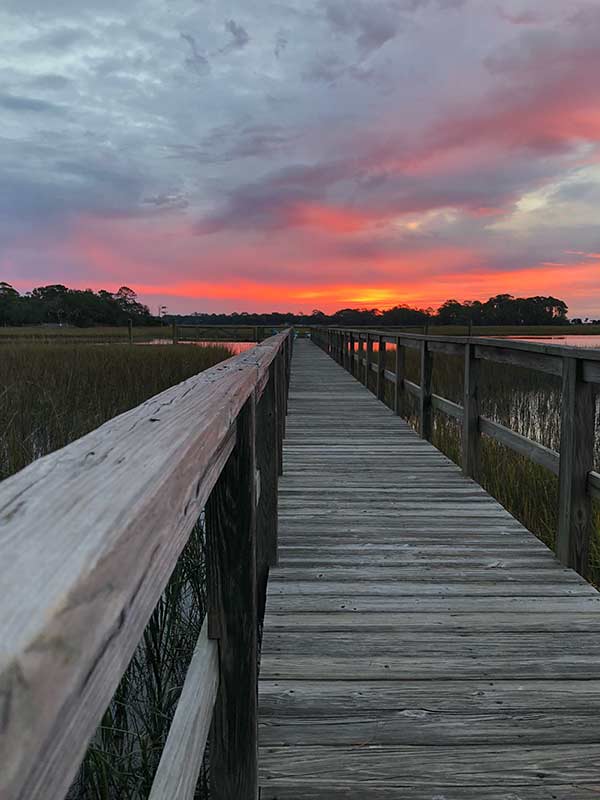 Coastal walkway and sunset