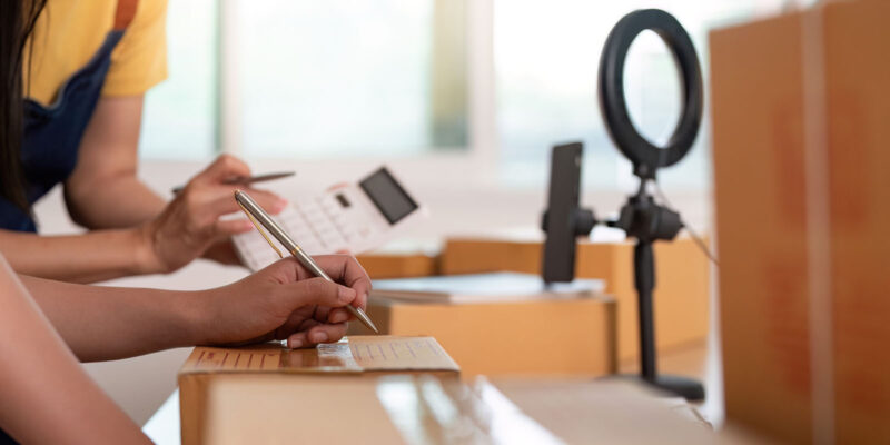 Entrepreneurs filling out Non-QM Loan forms