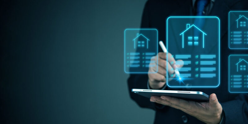 Business Man Looking At Foreign National Loans On Device